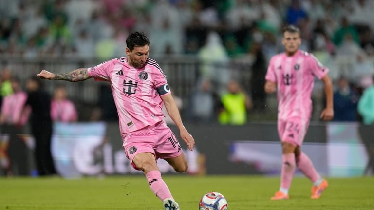 Inter Miami's Lionel Messi winds up to kick the ball...