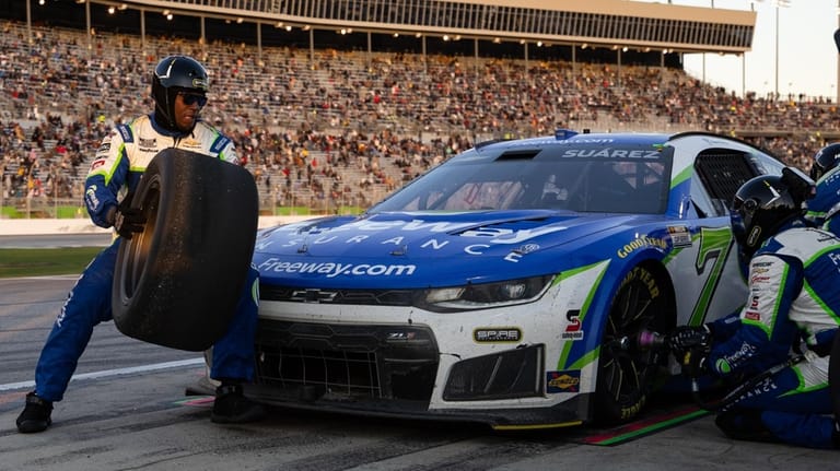 Daniel Suárez's team works during a NASCAR Cup Series auto...