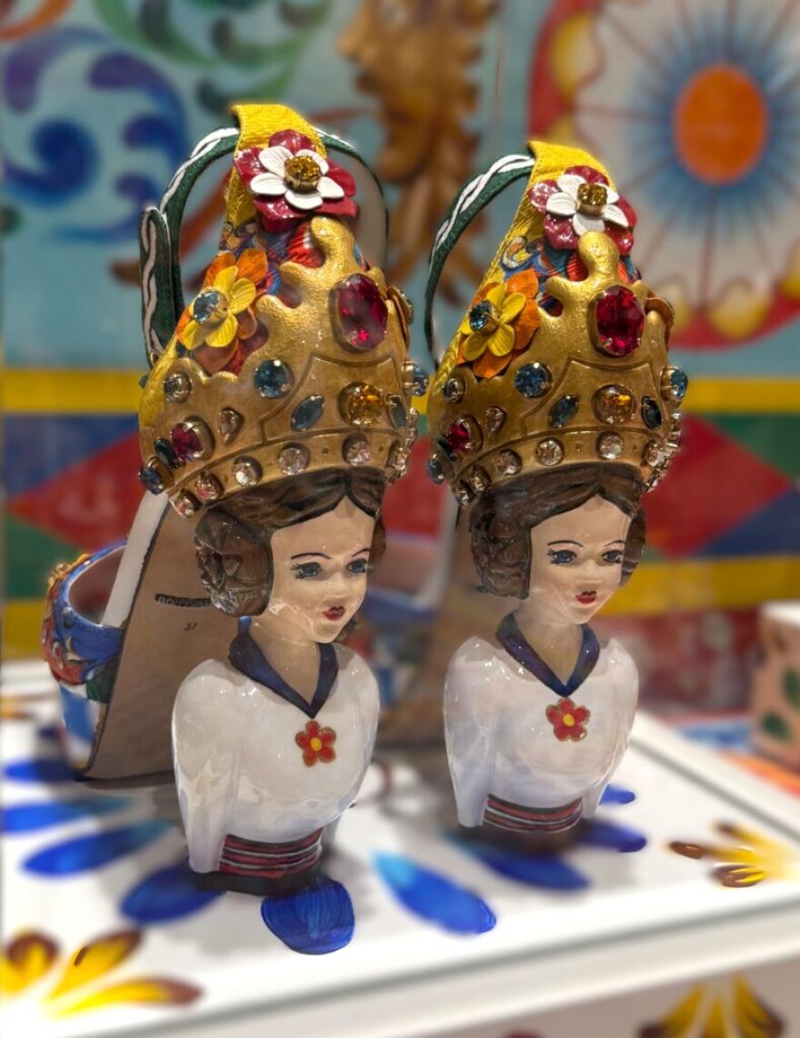 In the display dedicated to Sicily, the heels on a pair of shoes incorporate folkloric dolls in “From the Heart to the Hands: Dolce & Gabbana.”