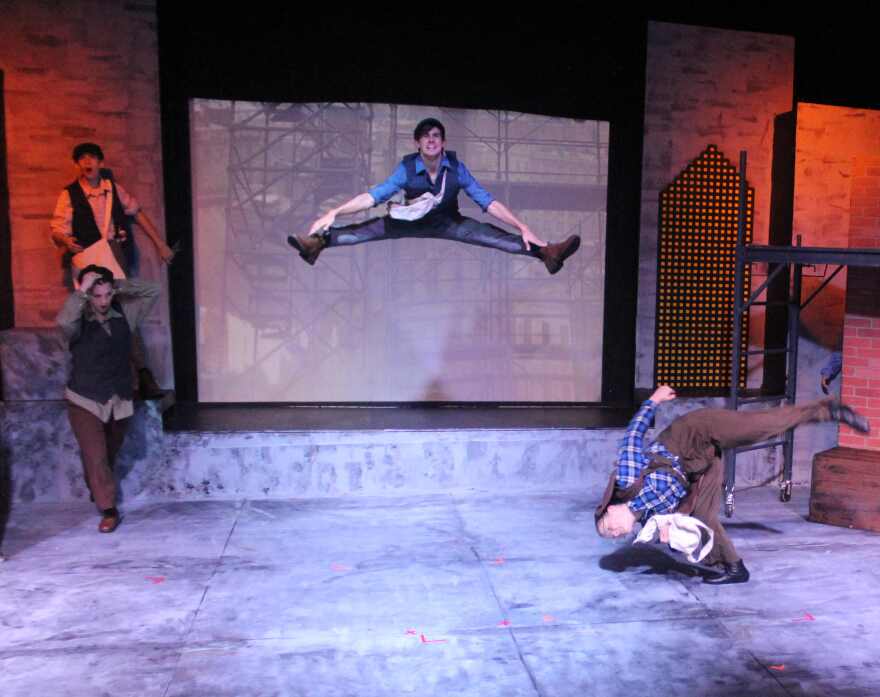 Cole Edwards catches air as Jack 'Cowboy' Kelly in 'Newsies'