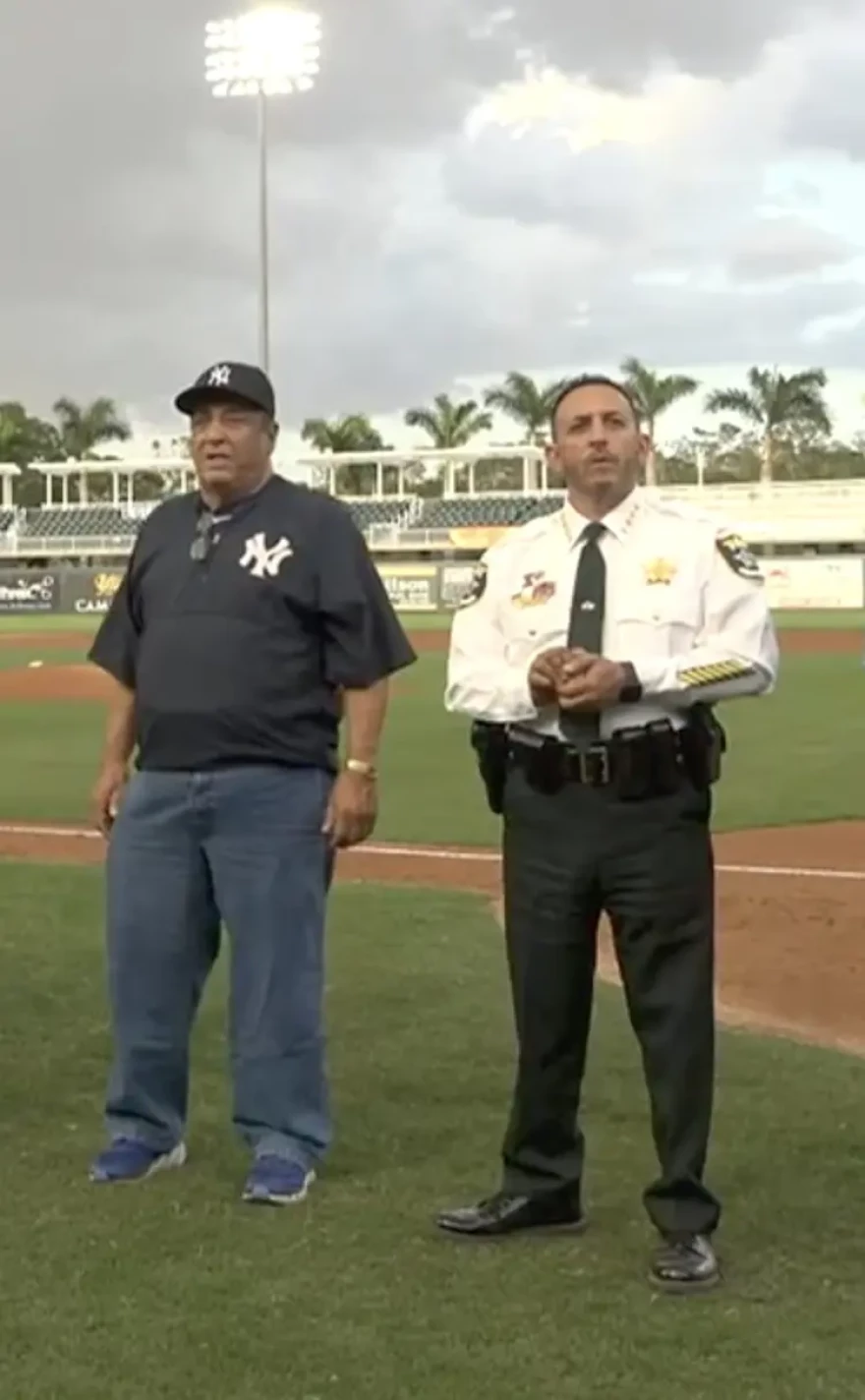 The sheriff and his father at Fort Myers Mighty Mussels game in 2023.