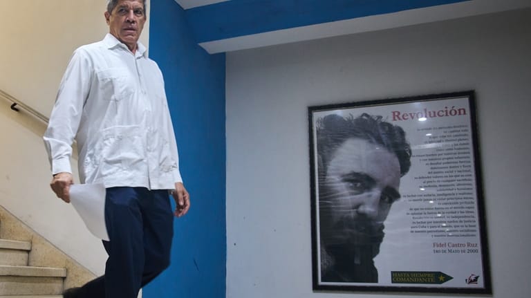 Cuba's Deputy Foreign Minister Carlos Fernandez de Cossio walks to...