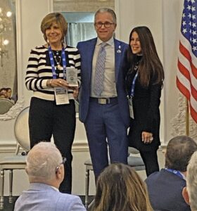 (L-R): Karen Zemel, Broward Federation’s JCRC chair, presents an engraved tzedakah box to Rep. Michael Gottlieb, pictured with his wife Georgia.