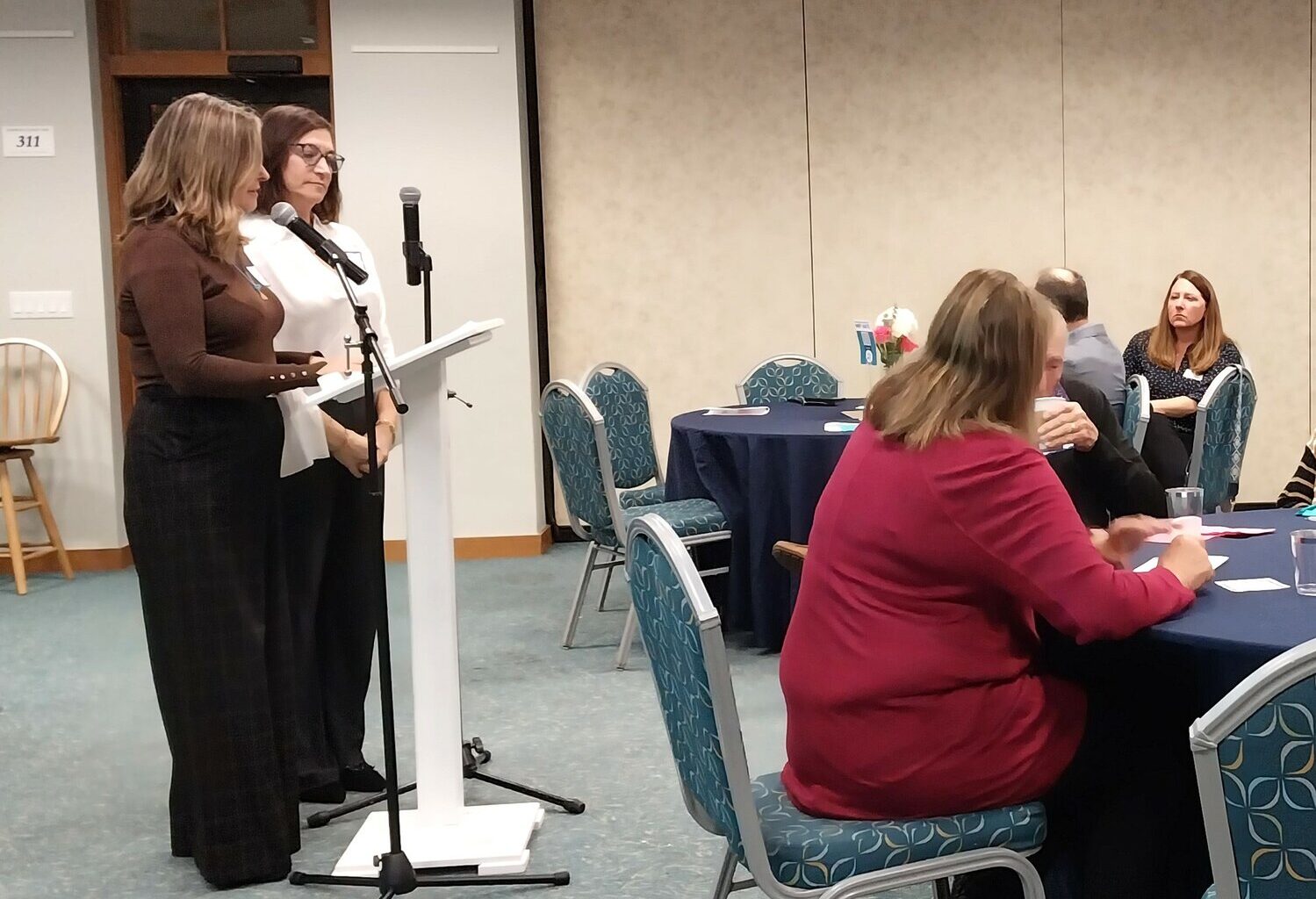 Karen Freedman and Laurie Berger introduce the speakers.