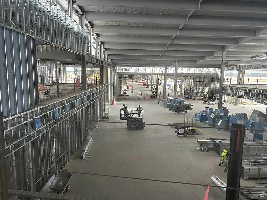 Located on a mezzanine level, the Delta Sky Club and the Club Jax lounges overlook the food hall below with planned restaurants Chick-fil-A, Pana Express, V Pizza and Willie Jewell’s BBQ. Located on a mezzanine level, the Delta Sky Club and the Club Jax lounges overlook the food hall below with planned restaurants Chick-fil-A, Pana Express, V Pizza and Willie Jewell’s BBQ.