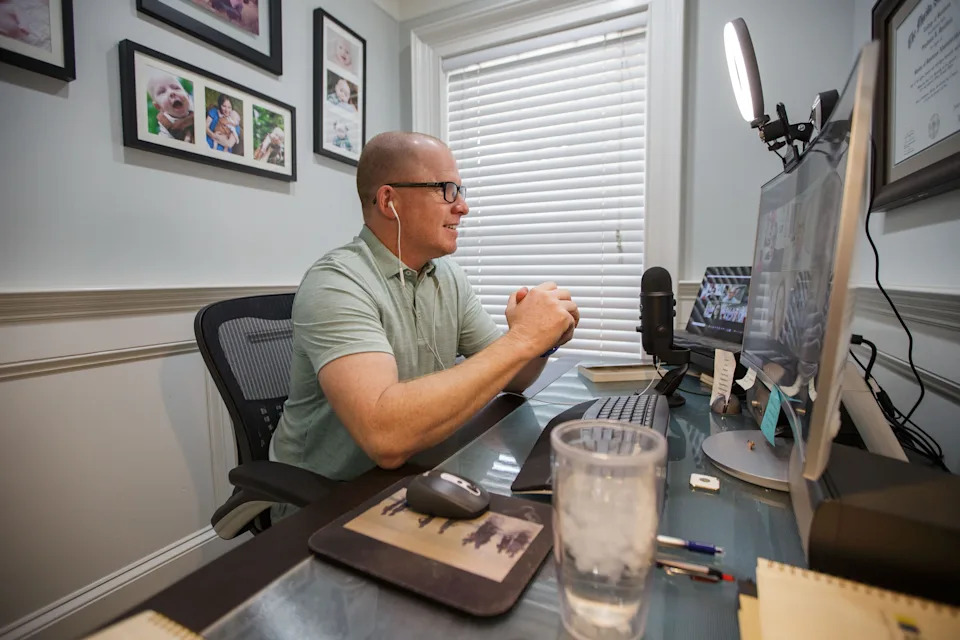 Co-Founder and President of BowStern Marketing Communications Tom Derzypolski leads a Zoom meeting in his home office Monday, Nov. 1, 2021.
