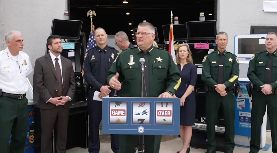 Brevard County Sheriff Wayne Ivey joins Attorney General James Uthmeier and other law enforcement officials at a Titusville press conference on illegal gambling crackdowns around the state.