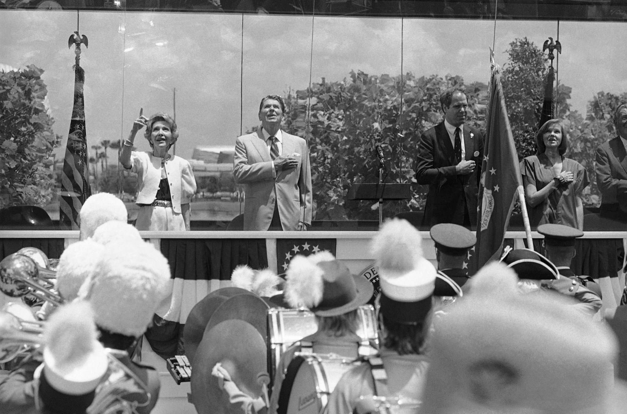 First Lady Nancy Reagan, left, points to birds that were...