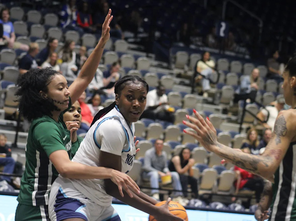 University of North Florida forward Dezuray McGill (30) holds the ball in the post against Jacksonville University during women's college basketball on Feb. 14, 2026. [Clayton Freeman/Florida Times-Union]