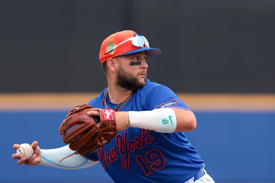 New York Mets third baseman Bo Bichette (19) throws to first base but cannot retire Miami Marlins third baseman Connor Norby (not pictured) during the fourth inning on Feb. 21, 2026, at Clover Park.