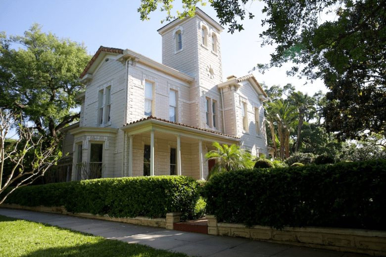 Exterior view of the historic William A. Morrison House (1885) in South Tampa’s Hyde Park district, a white Italianate-style remodeled homestead located at 850 S. Newport Ave.