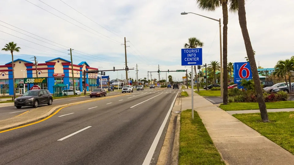 Cocoa beach, Florida, USA - April 29, 2018: The central road with shops, restaurants and hotels at Cocoa beach, Florida, USA on April 29, 2018
