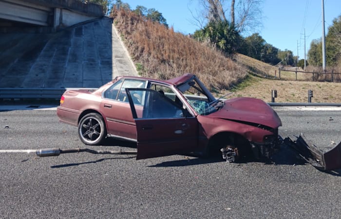 1 dead when vehicle drives off Florida overpass and crashes into car on I-75
