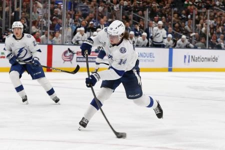Oct 18, 2025; Columbus, Ohio, USA; Tampa Bay Lightning center Conor Geekie (14) shoots the puck against the Columbus Blue Jackets during the third period at Nationwide Arena.