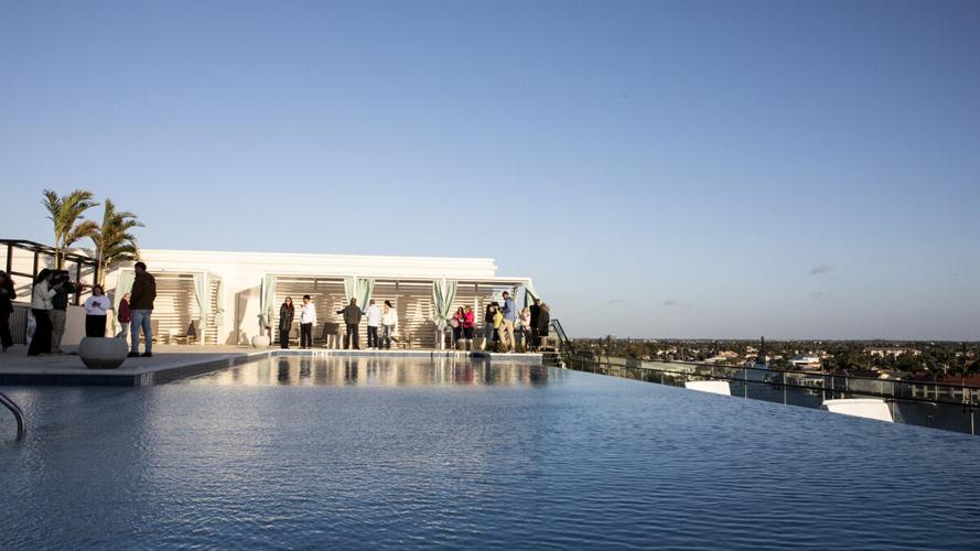 Guests tour rooftop amenities at Bimini Square