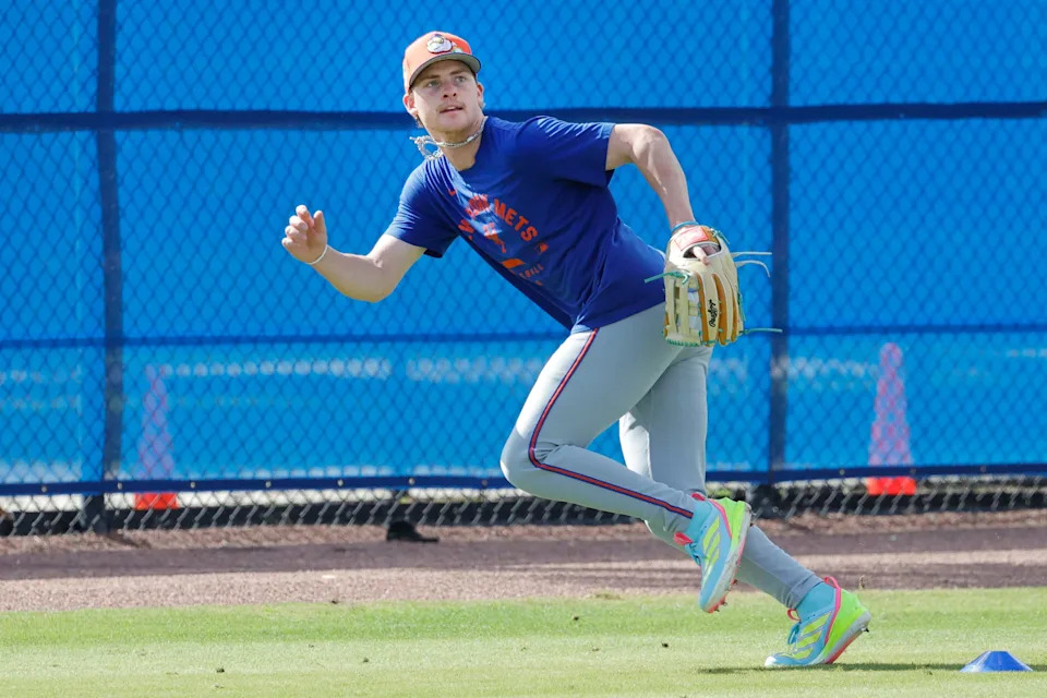 New York Mets outfielder Carson Benge (93) chases a fly ball during spring training workouts on Feb. 18, 2026, at Clover Park.