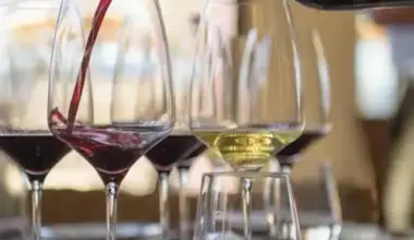 wine being poured into a glass