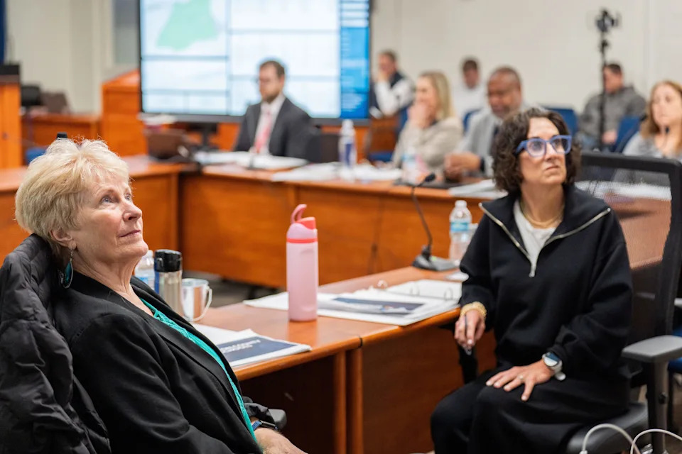 Leon County Schools Board member Roseanne Wood, left, reviews data regarding enrollment throughout the county during the LCSB retreat on Monday, Jan. 26, 2026.