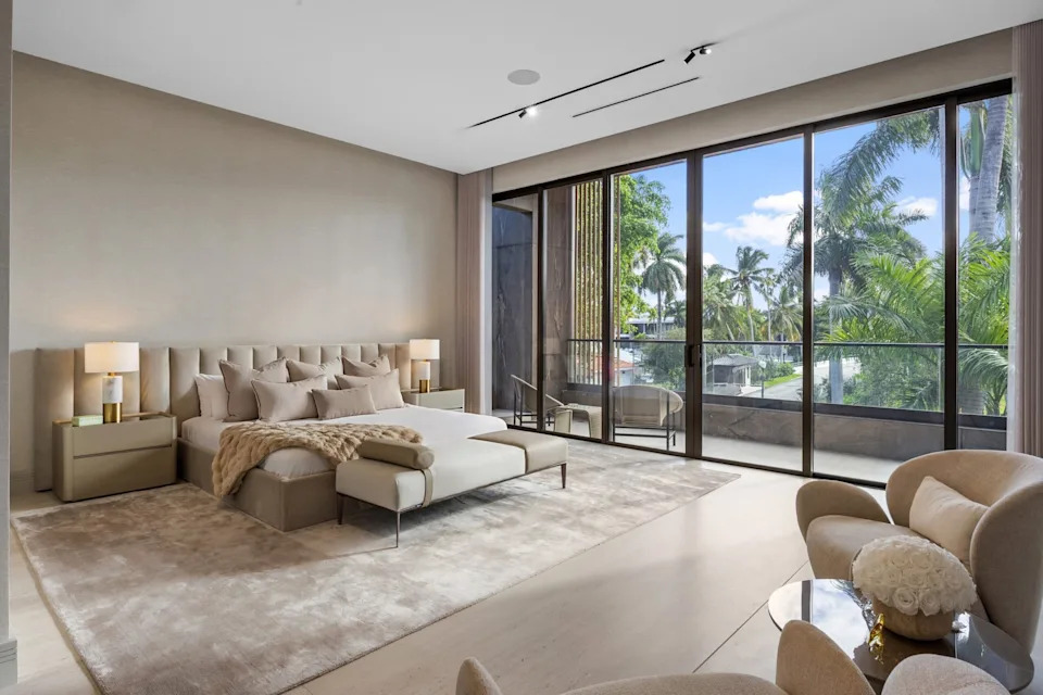 There are seven bedrooms and 7 1/2-bathrooms inside the modern manse.