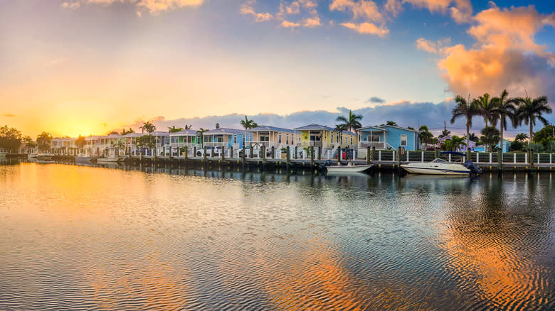 The sunsetting over canal-front homes in the Florida Keys