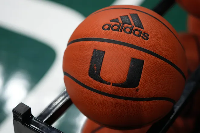 Dec 8, 2021; Coral Gables, Florida, USA; A general view of a basketball with the University of Miami logo on a rack prior to the game between the Miami Hurricanes and the Lipscomb Bisons at Watsco Center. Mandatory Credit: Jasen Vinlove-USA TODAY Sports
