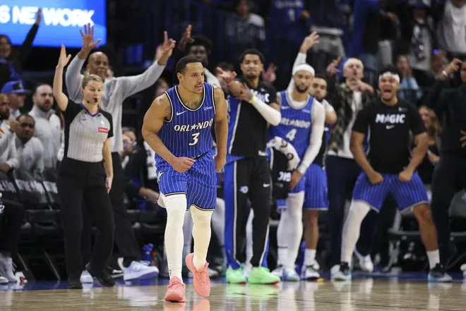 Jan 30, 2026; Orlando, Florida, USA; Orlando Magic guard Desmond Bane (3) reacts after a three-point basket against the Toronto Raptors in the fourth quarter at Kia Center.