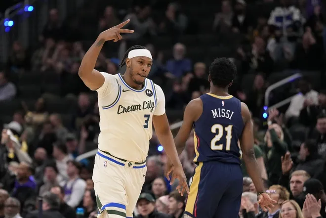 Feb 4, 2026; Milwaukee, Wisconsin, USA; Milwaukee Bucks center Myles Turner (3) celebrates after scoring a basket during overtime against the New Orleans Pelicans at Fiserv Forum.