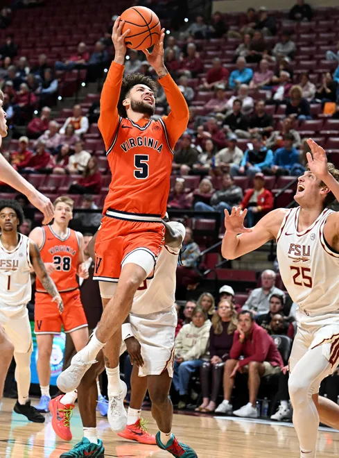 Feb 10, 2026; Tallahassee, Florida, USA; Virginia Cavaliers guard Sam Lewis (5) shoots the ball during the first half against the Florida State Seminoles at Donald L. Tucker Center. Mandatory Credit: Melina Myers-Imagn Images