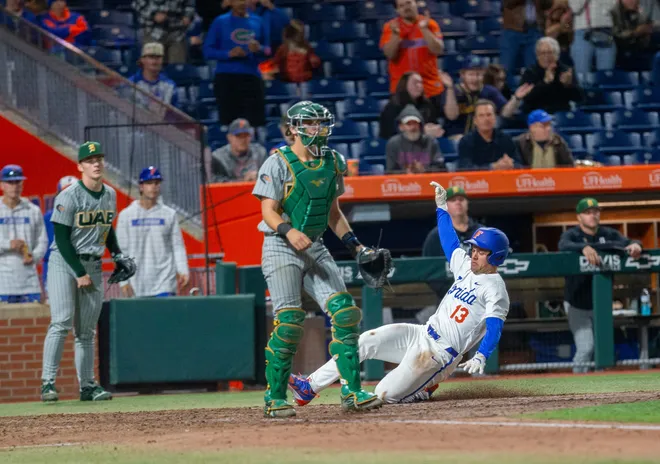 Florida's infielder Landon Stripling (13) with a run against UAB, Friday, February 13, 2026, at Condron Family Ballpark in Gainesville, Florida. The Gators lost Game 1 to the Blazers 9-7. [Cyndi Chambers/ Gainesville Sun] 2026