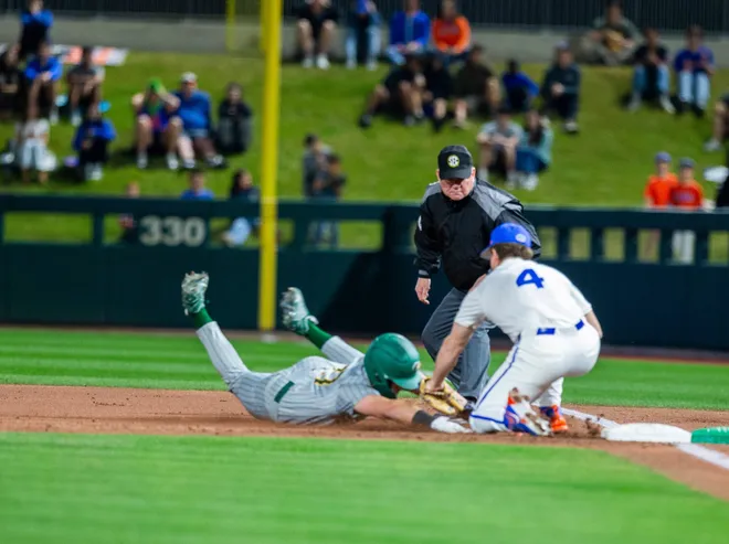 Florida's infielder Cade Kurland (4) makes the tag in the first inning against UAB, Friday, February 13, 2026, at Condron Family Ballpark in Gainesville, Florida. The Gators lost Game 1 to the Blazers 9-7. [Cyndi Chambers/ Gainesville Sun] 2026