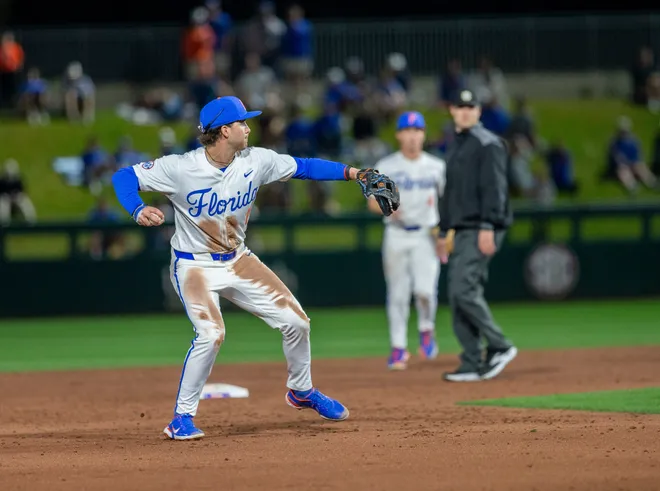 Florida's infielder Brendan Lawson (11) with the throw to first against UAB, Friday, February 13, 2026, at Condron Family Ballpark in Gainesville, Florida. The Gators lost Game 1 to the Blazers 9-7. [Cyndi Chambers/ Gainesville Sun] 2026
