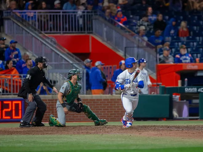 Florida's infielder Landon Stripling (13) with a single to left field against UAB, Friday, February 13, 2026, at Condron Family Ballpark in Gainesville, Florida. The Gators lost Game 1 to the Blazers 9-7. [Cyndi Chambers/ Gainesville Sun] 2026
