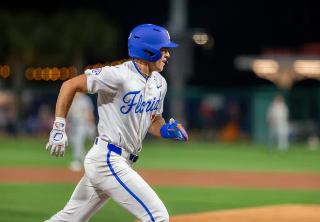 Florida's outfielder Kyle Jones (3) scores a run for the Gators on Opening Day against UAB, Friday, February 13, 2026, at Condron Family Ballpark in Gainesville, Florida. The Gators lost Game 1 to the Blazers 9-7. 
[Cyndi Chambers/ Gainesville Sun] 2026