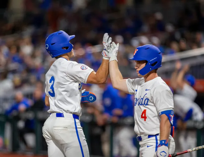 Florida's outfielder Kyle Jones (3) scores a run for the Gators on Opening Day against UAB, Friday, February 13, 2026, at Condron Family Ballpark in Gainesville, Florida. The Gators lost Game 1 to the Blazers 9-7. 
[Cyndi Chambers/ Gainesville Sun] 2026