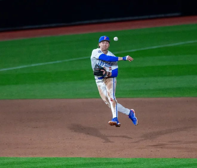 Florida's infielder Brendan Lawson (11) with the throw to first against UAB, Friday, February 13, 2026, at Condron Family Ballpark in Gainesville, Florida. The Gators lost Game 1 to the Blazers 9-7. [Cyndi Chambers/ Gainesville Sun] 2026
