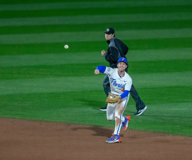 Florida's infielder Cade Kurland (4) with the throw to first against UAB, Friday, February 13, 2026, at Condron Family Ballpark in Gainesville, Florida. The Gators lost Game 1 to the Blazers 9-7. [Cyndi Chambers/ Gainesville Sun] 2026