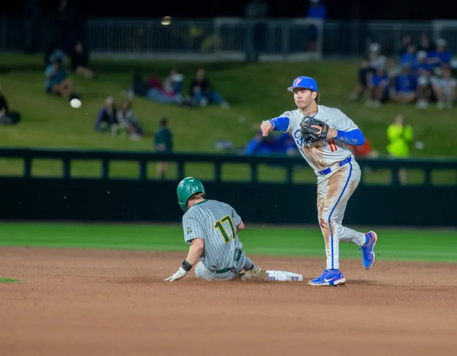 Florida's infielder Brendan Lawson (11) with the throw to first against UAB, Friday, February 13, 2026, at Condron Family Ballpark in Gainesville, Florida. The Gators lost Game 1 to the Blazers 9-7. [Cyndi Chambers/ Gainesville Sun] 2026