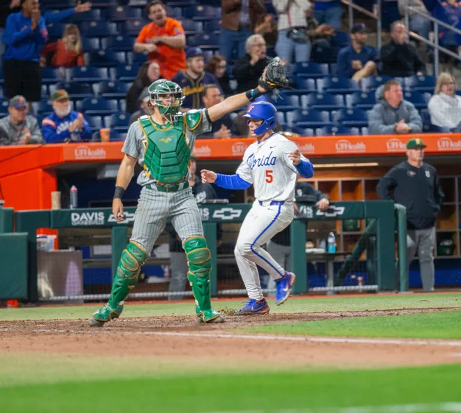 Florida's infielder Blake Cyr (5) scores a run against UAB, Friday, February 13, 2026, at Condron Family Ballpark in Gainesville, Florida. The Gators lost Game 1 to the Blazers 9-7. [Cyndi Chambers/ Gainesville Sun] 2026