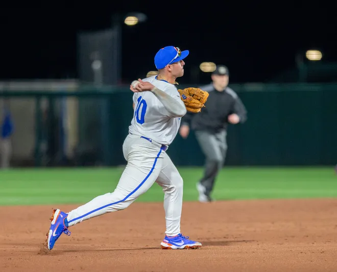 Florida's infielder Ethan Surowiec (10) with the throw to first against UAB, Friday, February 13, 2026, at Condron Family Ballpark in Gainesville, Florida. The Gators lost Game 1 to the Blazers 9-7. [Cyndi Chambers/ Gainesville Sun] 2026