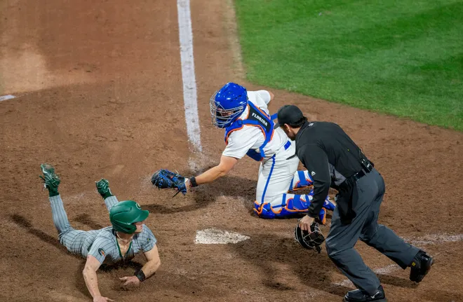 UABÃ•s utility Andrew Hunt (22) is safe at home against Florida, Friday, February 13, 2026, at Condron Family Ballpark in Gainesville, Florida. The Gators lost Game 1 to the Blazers 9-7. [Cyndi Chambers/ Gainesville Sun] 2026