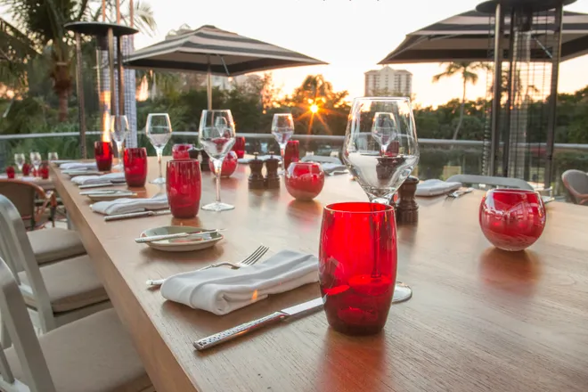 Outdoor dining at the CAVU Golf Club in Naples.