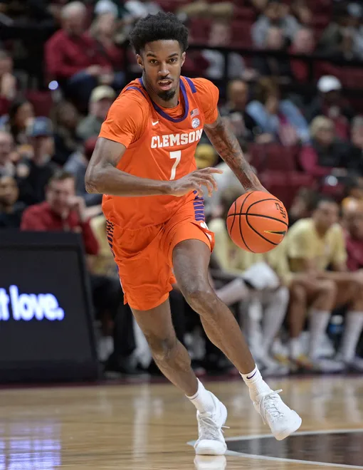 Feb 15, 2025; Tallahassee, Florida, USA; Clemson Tigers forward Chauncey Wiggins (7) dribbles the ball during the second half against the Florida State Seminoles at Donald L. Tucker Center. Mandatory Credit: Melina Myers-Imagn Images