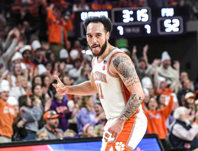 Jan 11, 2025; Clemson, South Carolina, USA; Clemson Tigers guard Jaeden Zachery (11) reacts after making a three point basket against the Florida State Seminoles during the second half at Littlejohn Coliseum. Mandatory Credit: Ken Ruinard/USA TODAY Network via Imagn Images