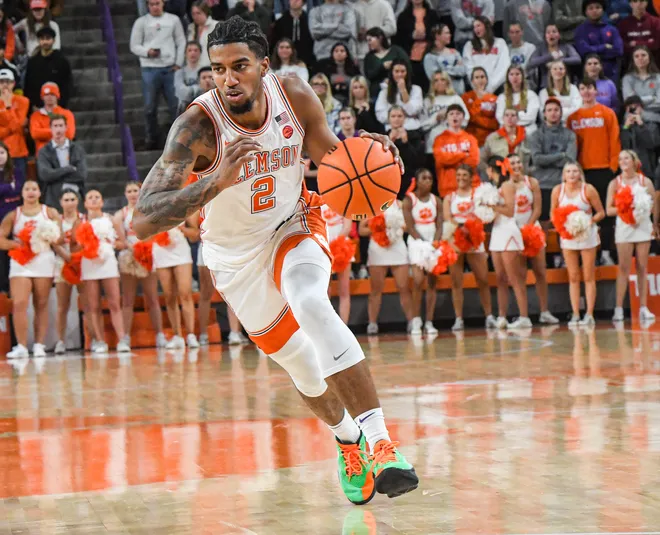 Clemson guard Dillon Hunter (2) dribbles toward the basket playing Florida State University during the second half at Littlejohn Coliseum in Clemson, S.C Saturday, January 11, 2025.