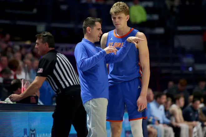 Feb 21, 2026; Oxford, Mississippi, USA; Florida Gators head coach Todd Golden talks with forward Thomas Haugh (10) during the second half against the Mississippi Rebels at The Sandy and John Black Pavilion at Ole Miss. Mandatory Credit: Petre Thomas-Imagn Images