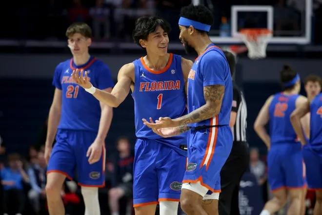 Feb 21, 2026; Oxford, Mississippi, USA; Florida Gators guard Xaivian Lee (1) reacts with guard Boogie Fland (0) during the second half against the Mississippi Rebels at The Sandy and John Black Pavilion at Ole Miss. Mandatory Credit: Petre Thomas-Imagn Images