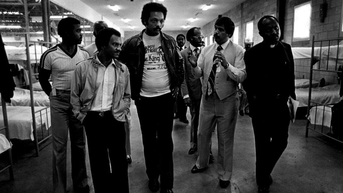 In this Miami Herald file photo, the Rev. Ray Fauntroy of the Southern Christian Leadership Conference, the Rev. Jesse Jackson, Cecilio Ruiz, director of Krome, and the Rev. Gerard Jean-Juste tour the Krome detention center.