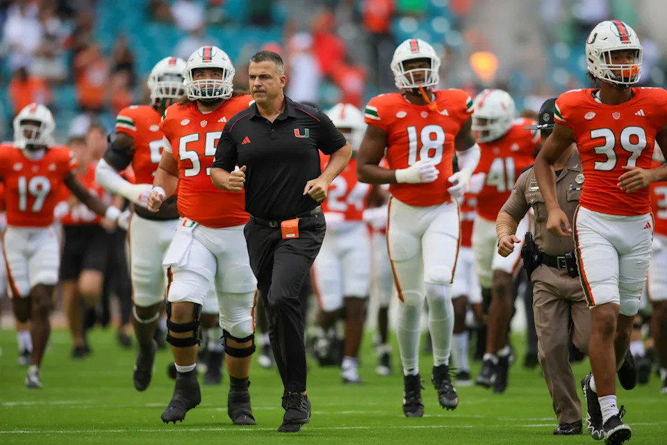 Miami Hurricanes head coach Mario Cristobal takes the field.Sam Navarro-USA TODAY Sports