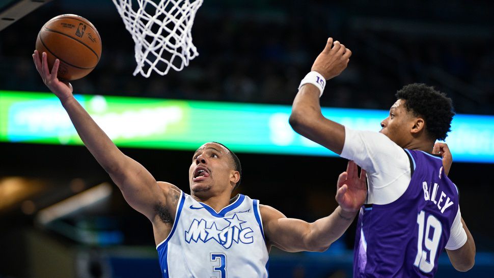 Orlando Magic guard Desmond Bane (3) goes up to shoot as Utah Jazz guard Ace Bailey (19) defends during the first half of an NBA basketball game, Saturday, Feb. 7, 2026, in Orlando, Fla. (AP Photo/Phelan M. Ebenhack)