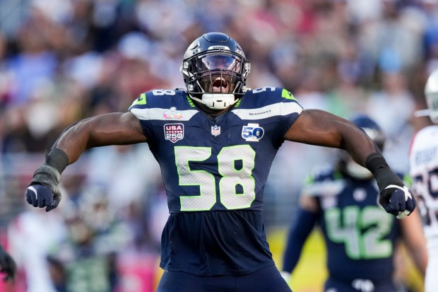 Seattle Seahawks linebacker Derick Hall (58) celebrates after sacking New England Patriots quarterback Drake Maye during the first half of the Super Bowl on Sunday, Feb. 8, 2026, in Santa Clara, California. (AP Photo/Morry Gash)
